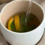 turmeric mint tea - pour hot water in a cup