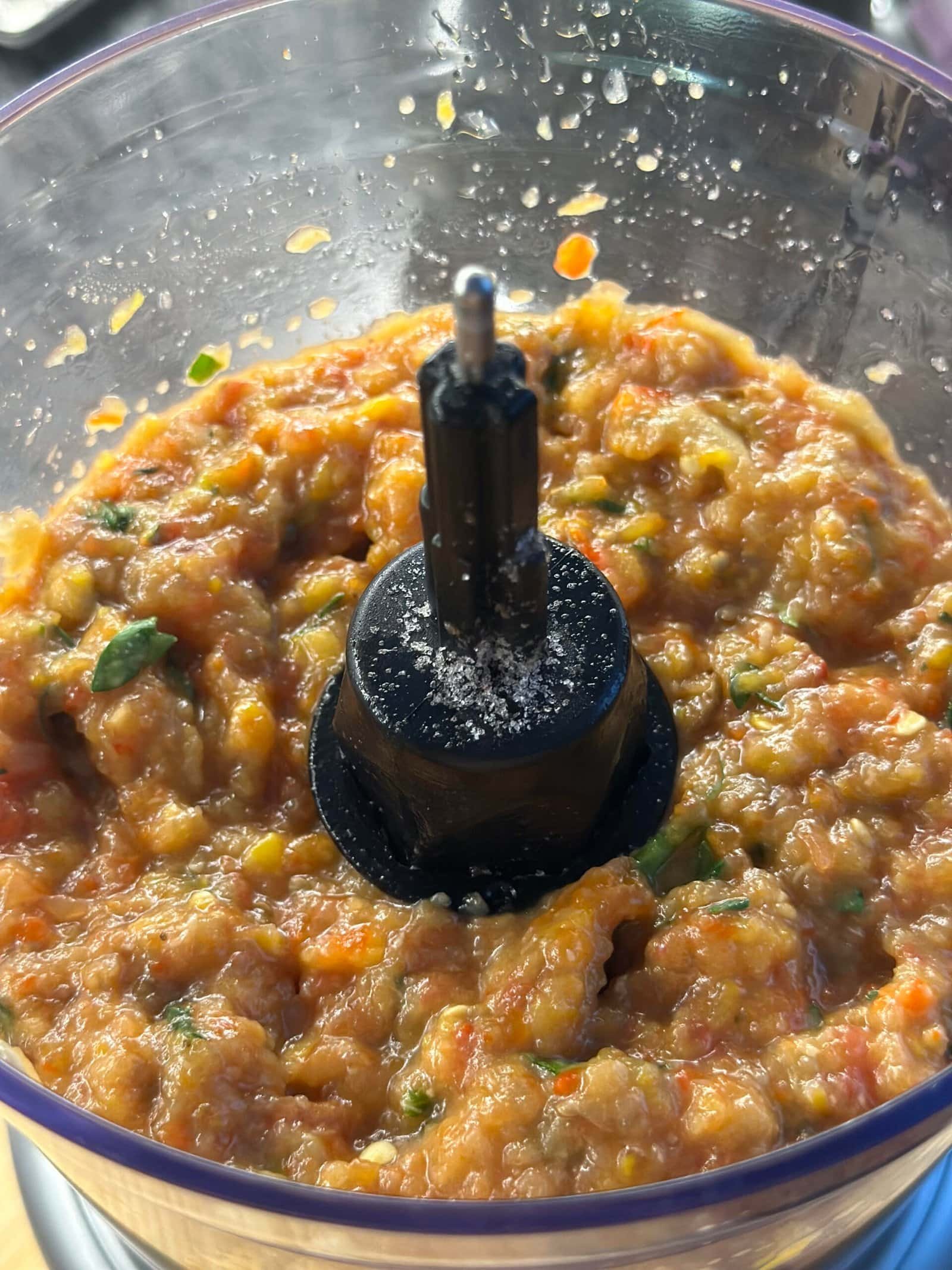 Roasted eggplant spread food in a food processor Roasted eggplant spread