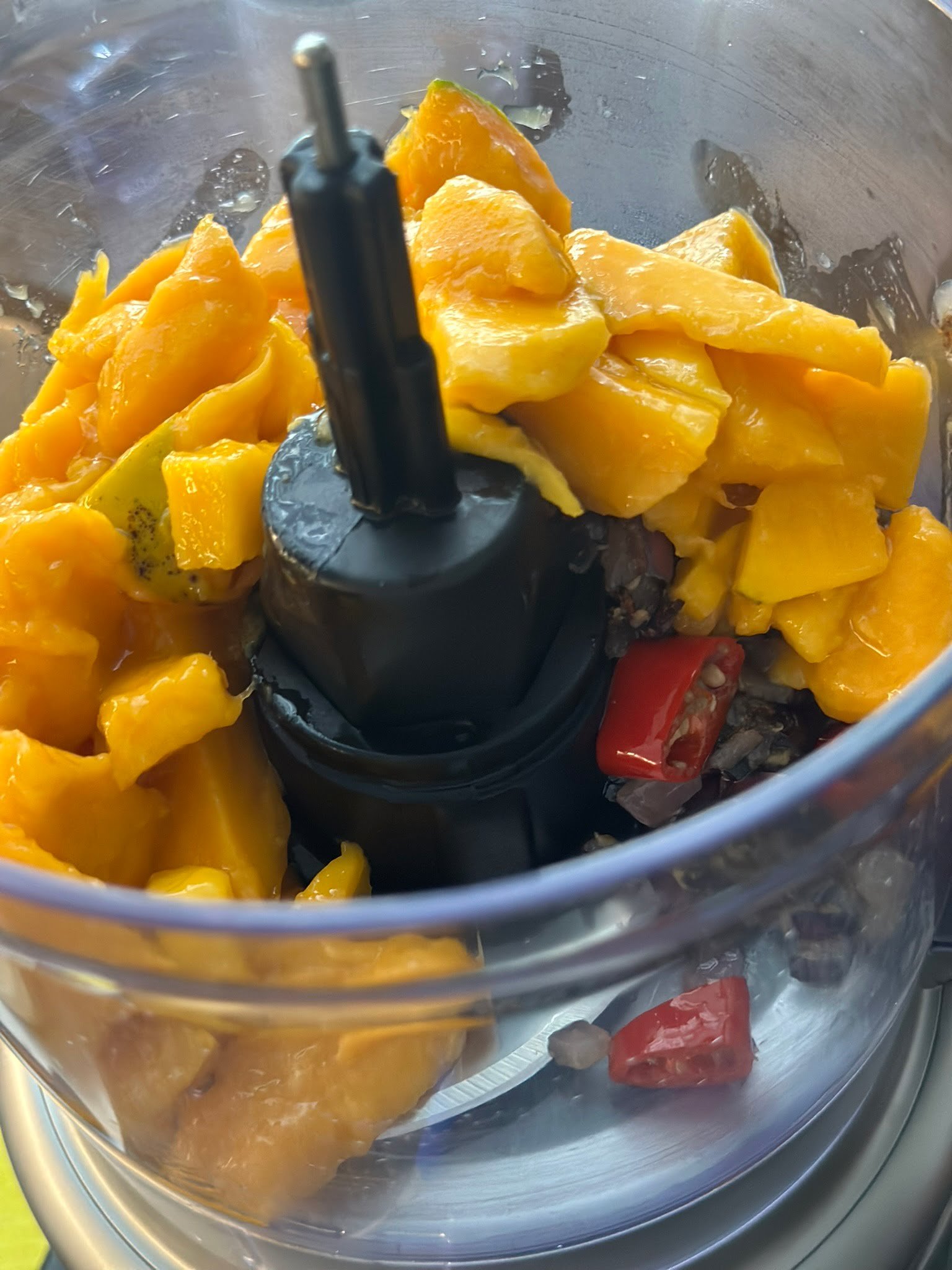 Easy Mango Curry Chicken veggies in a blender