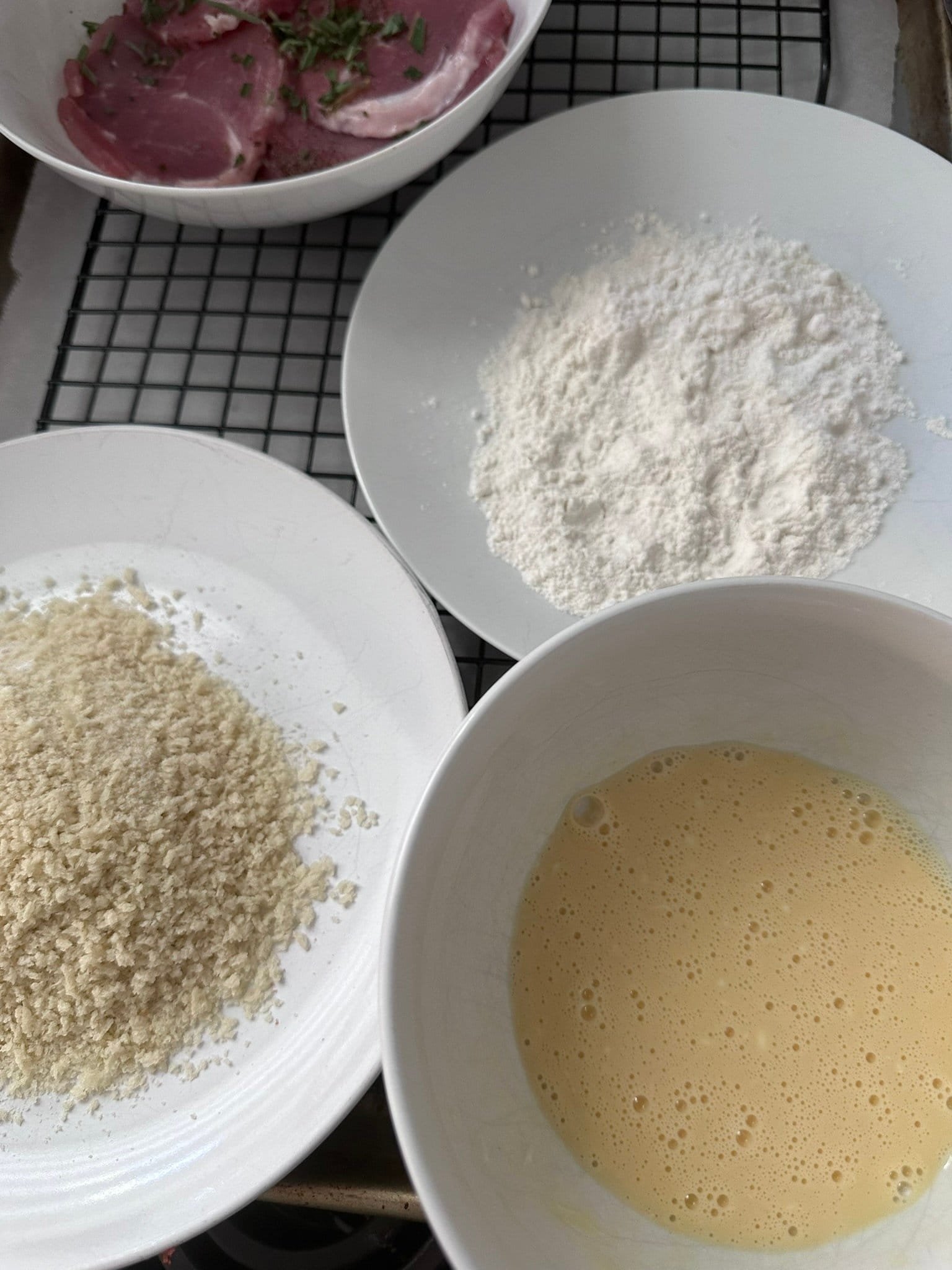 The Ultimate Cutlet Sandwich ingredients for cutlets on a rack