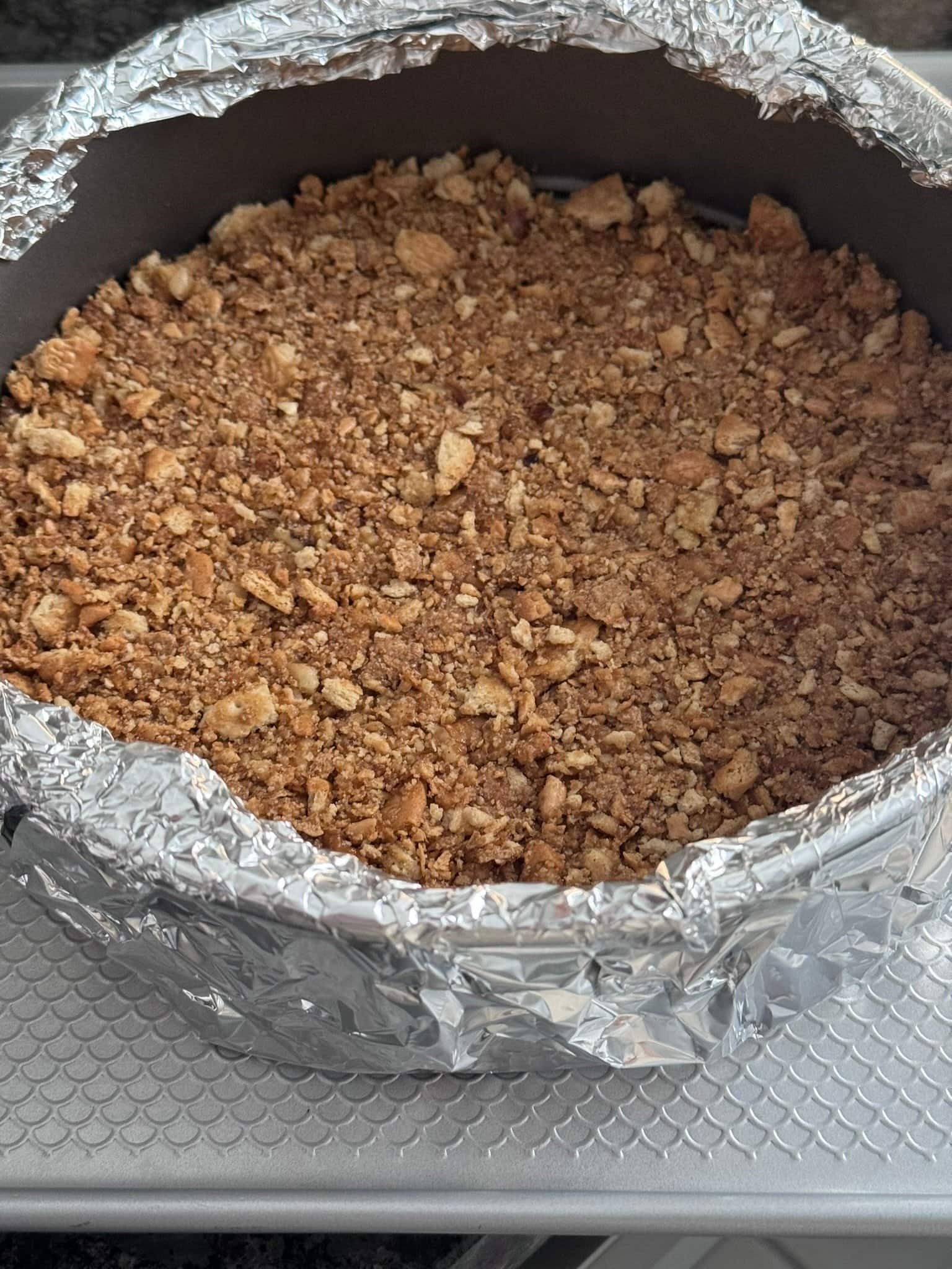 Maple Glazed Cheesecake getting crust ready for bake