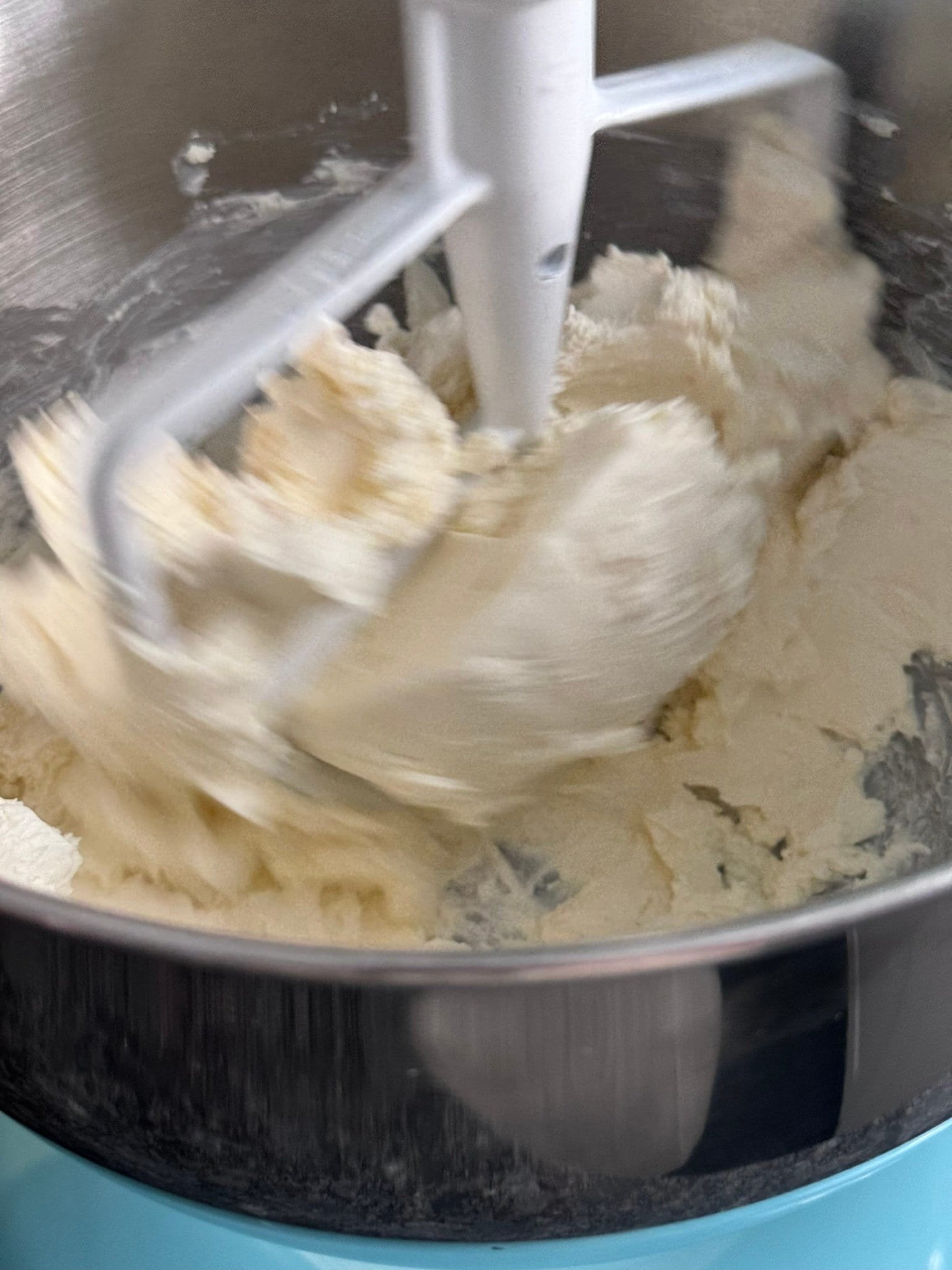 Maple Glazed Cheesecake mixing the cheese cream