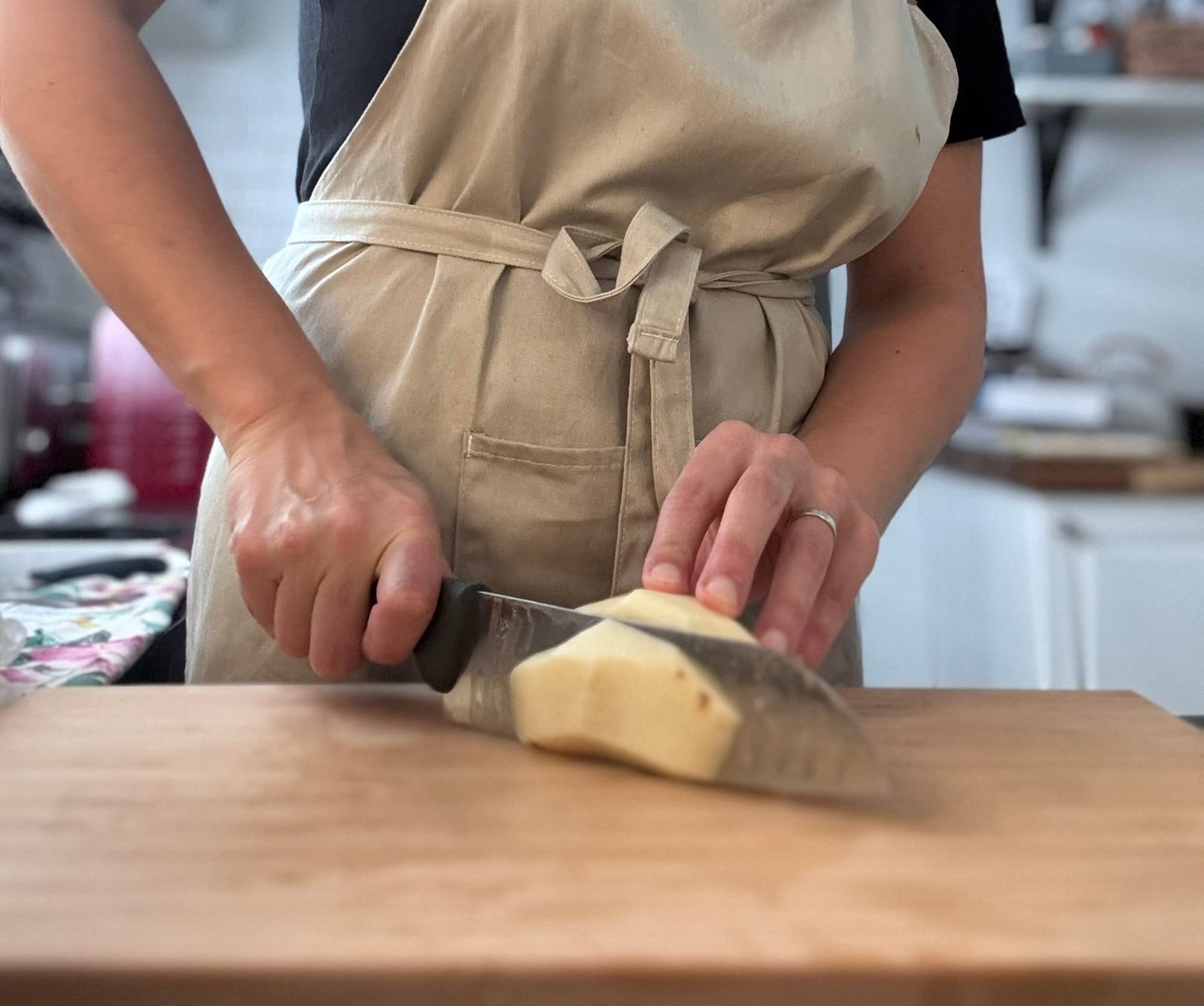 All-Dressed Potato Wedges cutting potato wedges