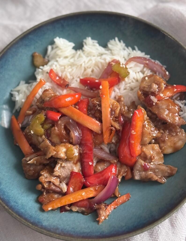 sticky pork on a rice