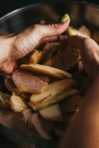 apples and cinnamon in a bowl