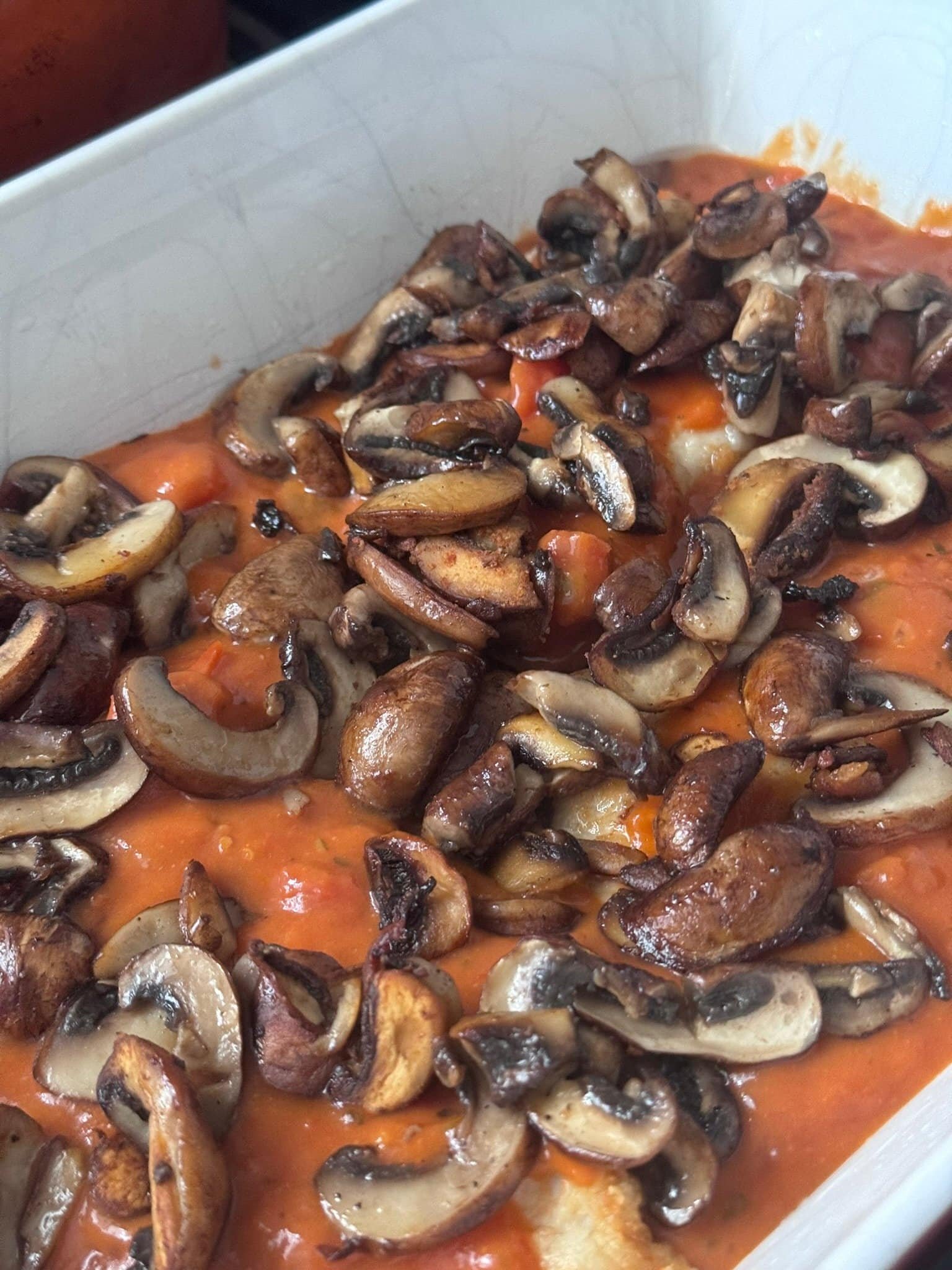 IMG_5631 chicken, tomato sauce and mushrooms in a casserole dish