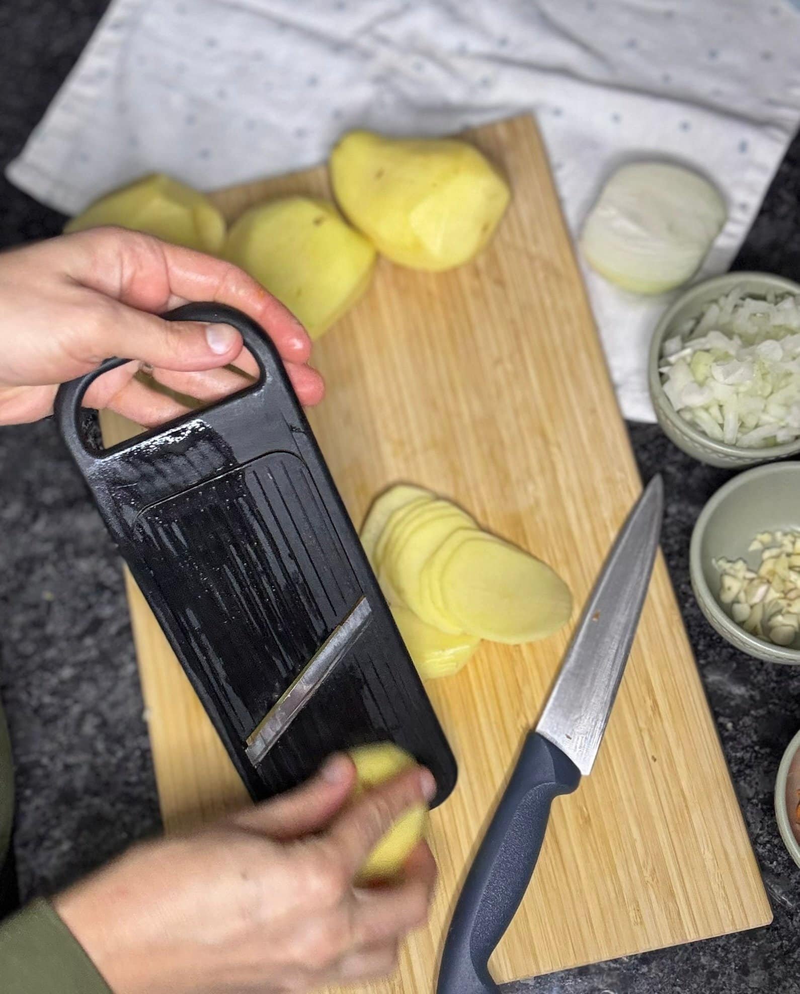 Classic Potato Moussaka Recipe cut potatoes on thin circle