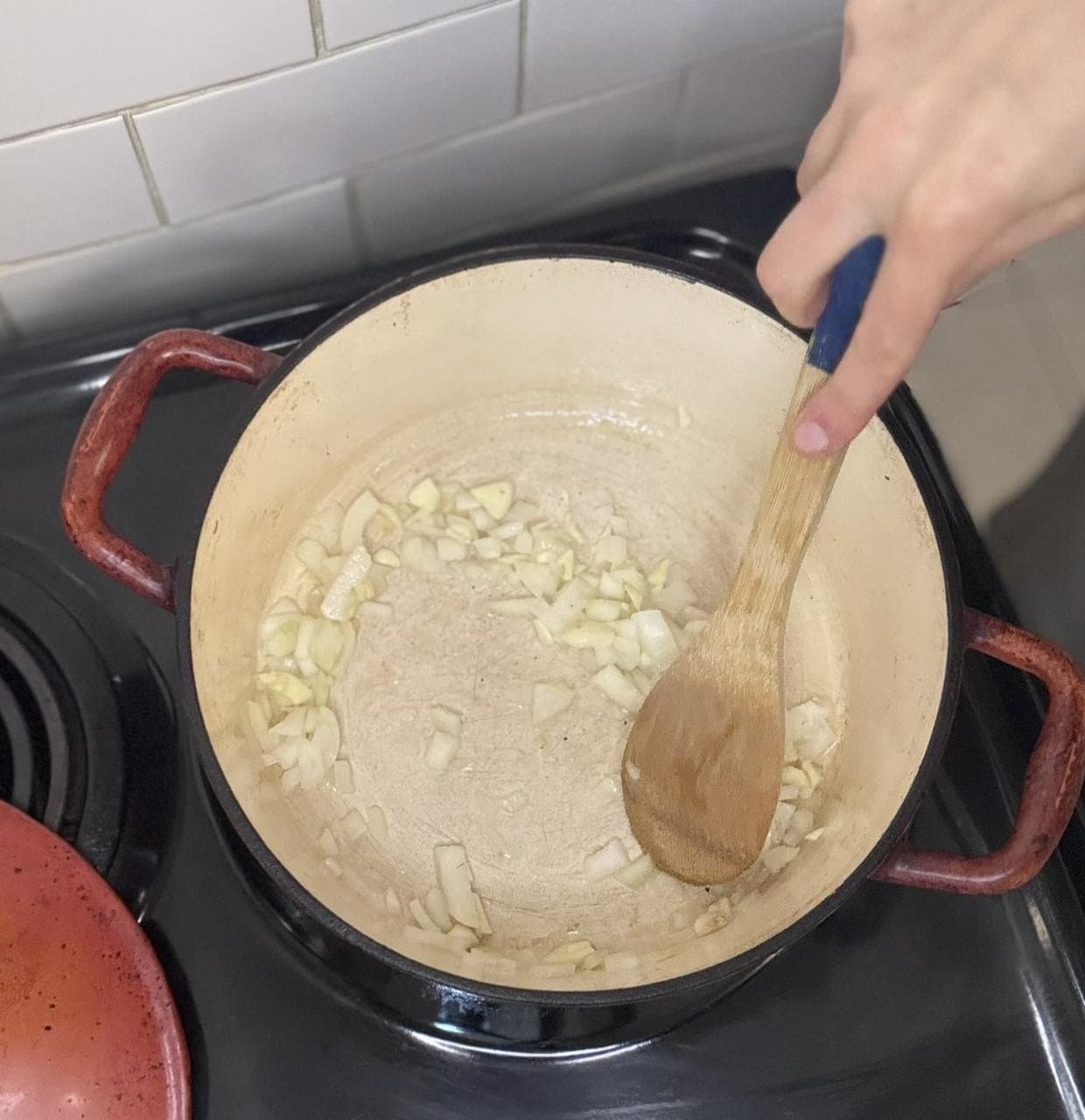 Healthy Carrot Soup with Ginger and Turmeric saute onion