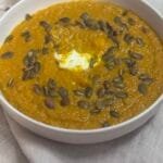 carrot ginger turmeric soup in a bowl