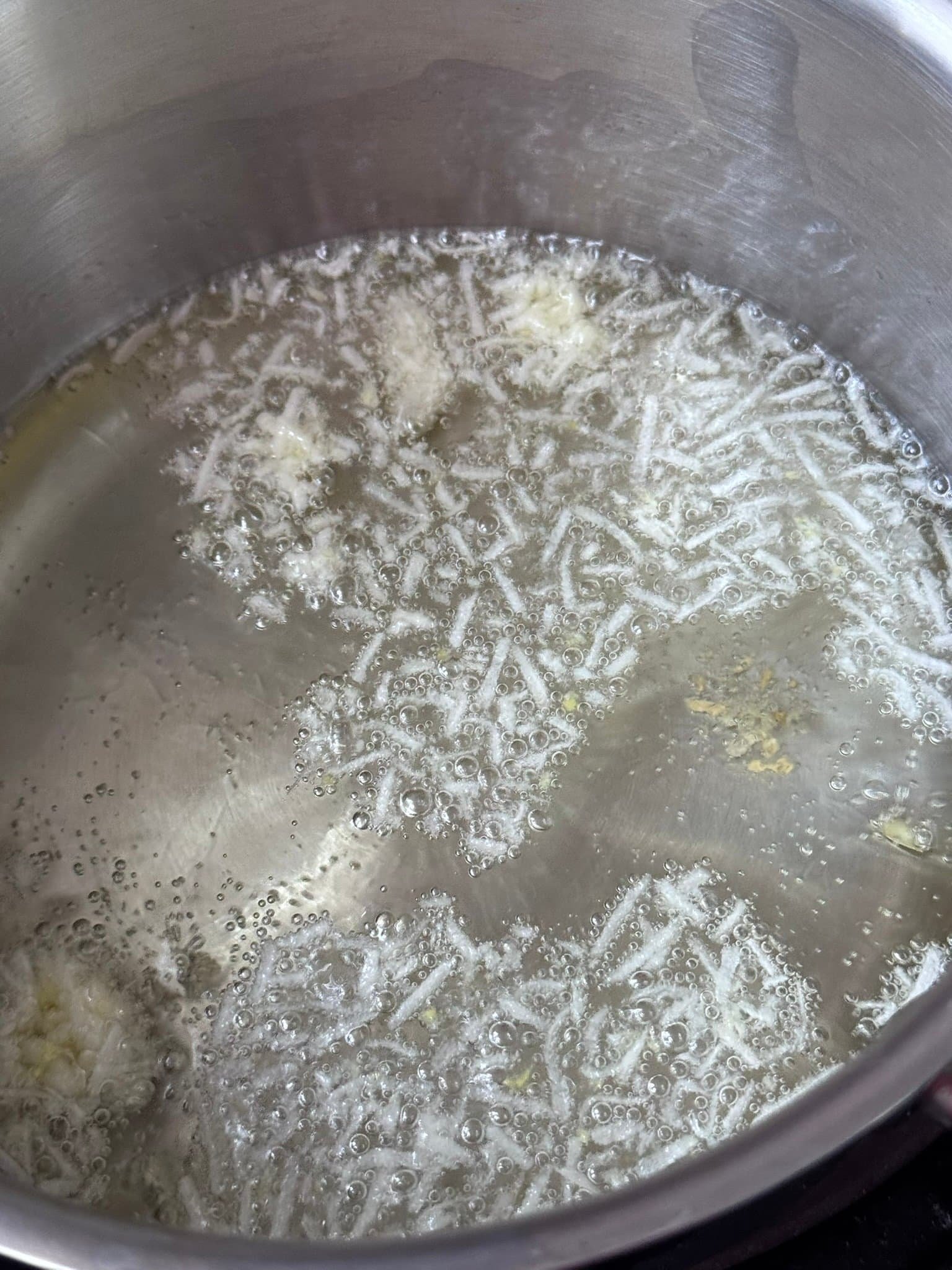 IMG_7641 cook oil in a pot