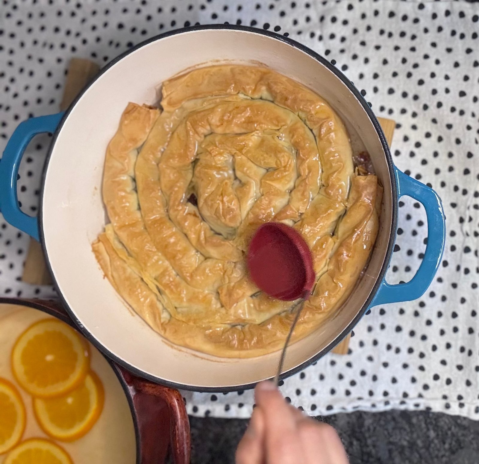 IMG_8023 pour sweet syrup over the baklava