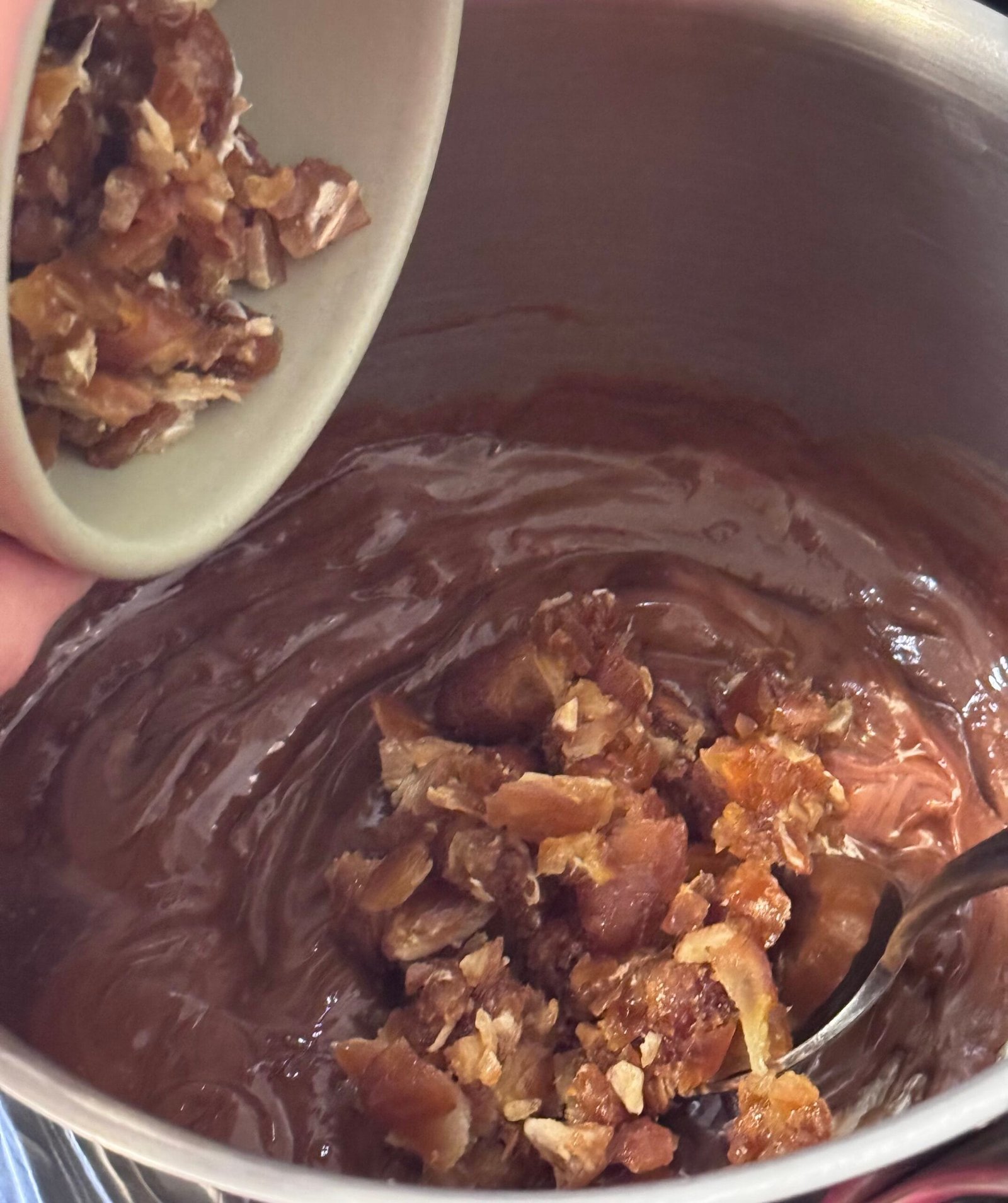 IMG_9079 stir ingredients to melt in a saucepan