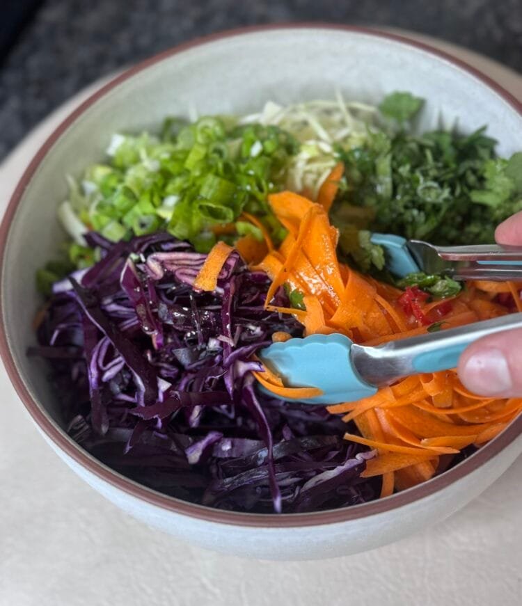Fresh and Spicy Coleslaw mix the vegetables