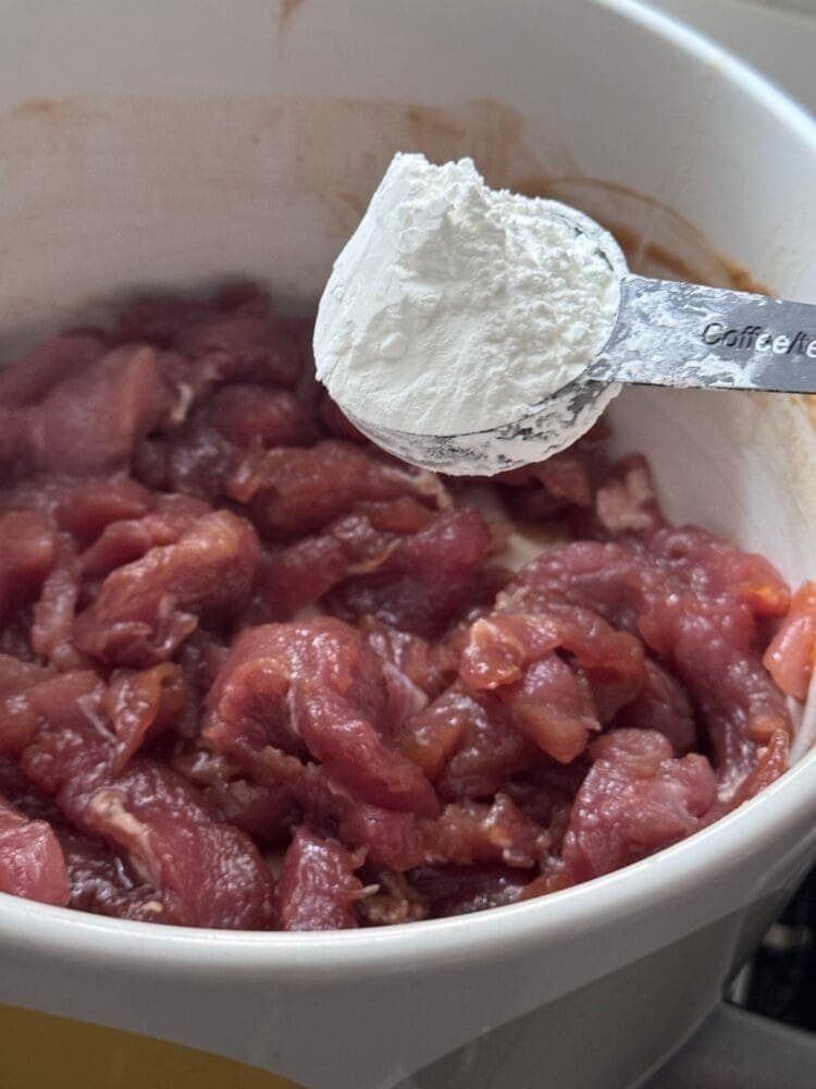 cornstarch dust the meat with cornstarch