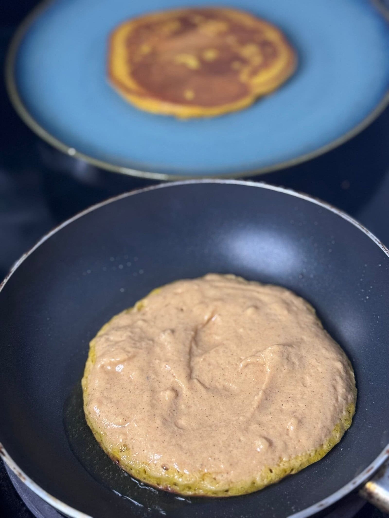 pancake in a pan cook the pancakes