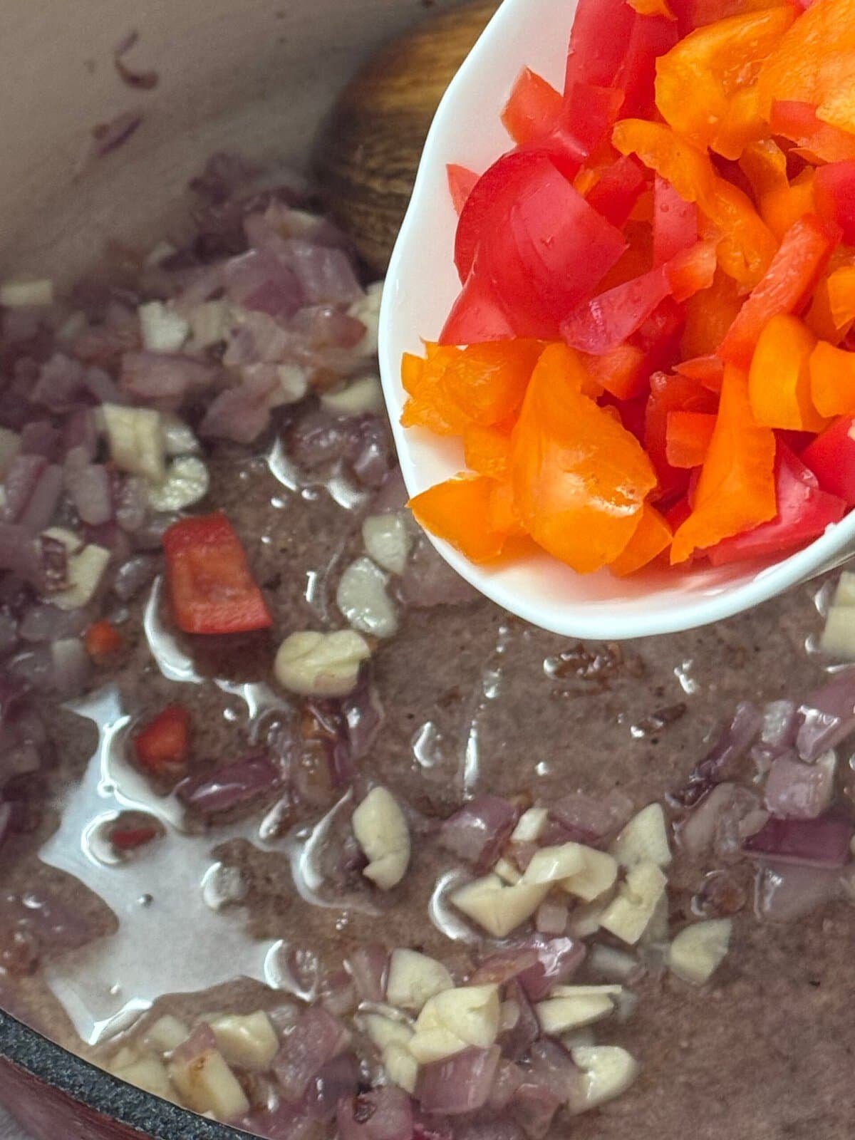 cook vegetables onions and pepper to cook