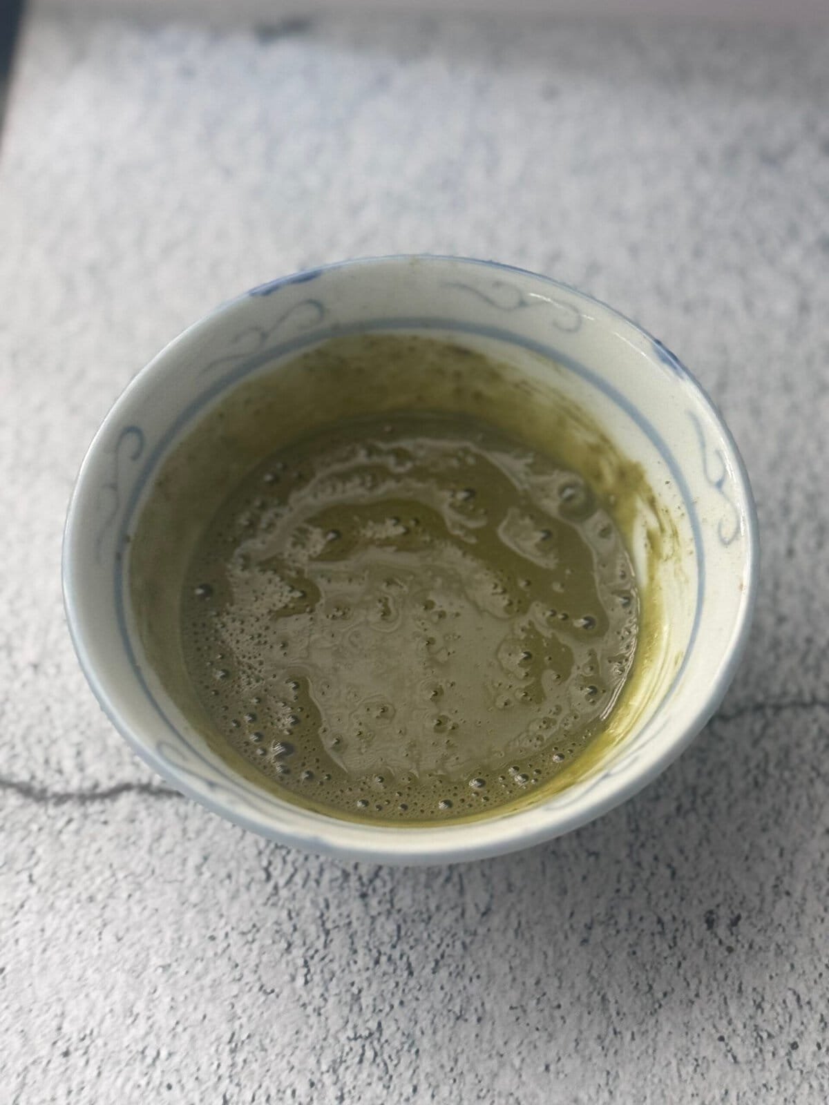 matcha matcha in a cup dissolved in water