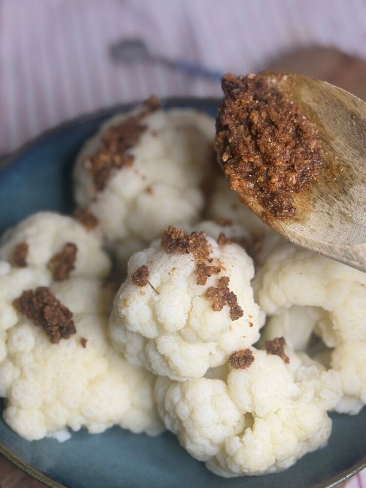 cauliflower add breadcrumbs over cauliflower